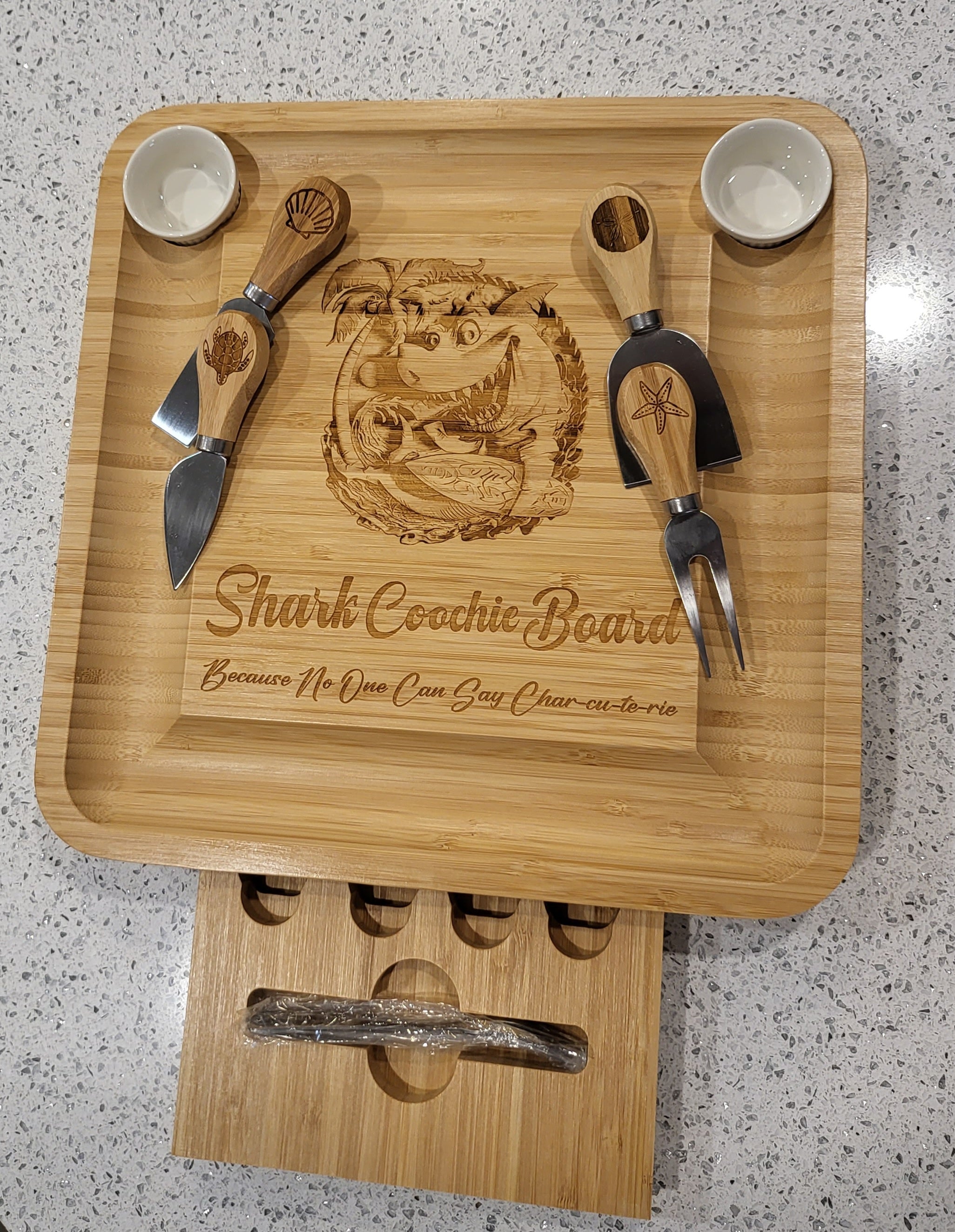 Shark Coochie Board with utensils